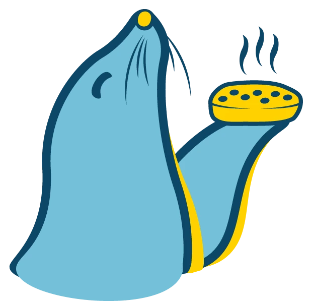 La foca de La Foquita con una focaccia humeante en la aleta